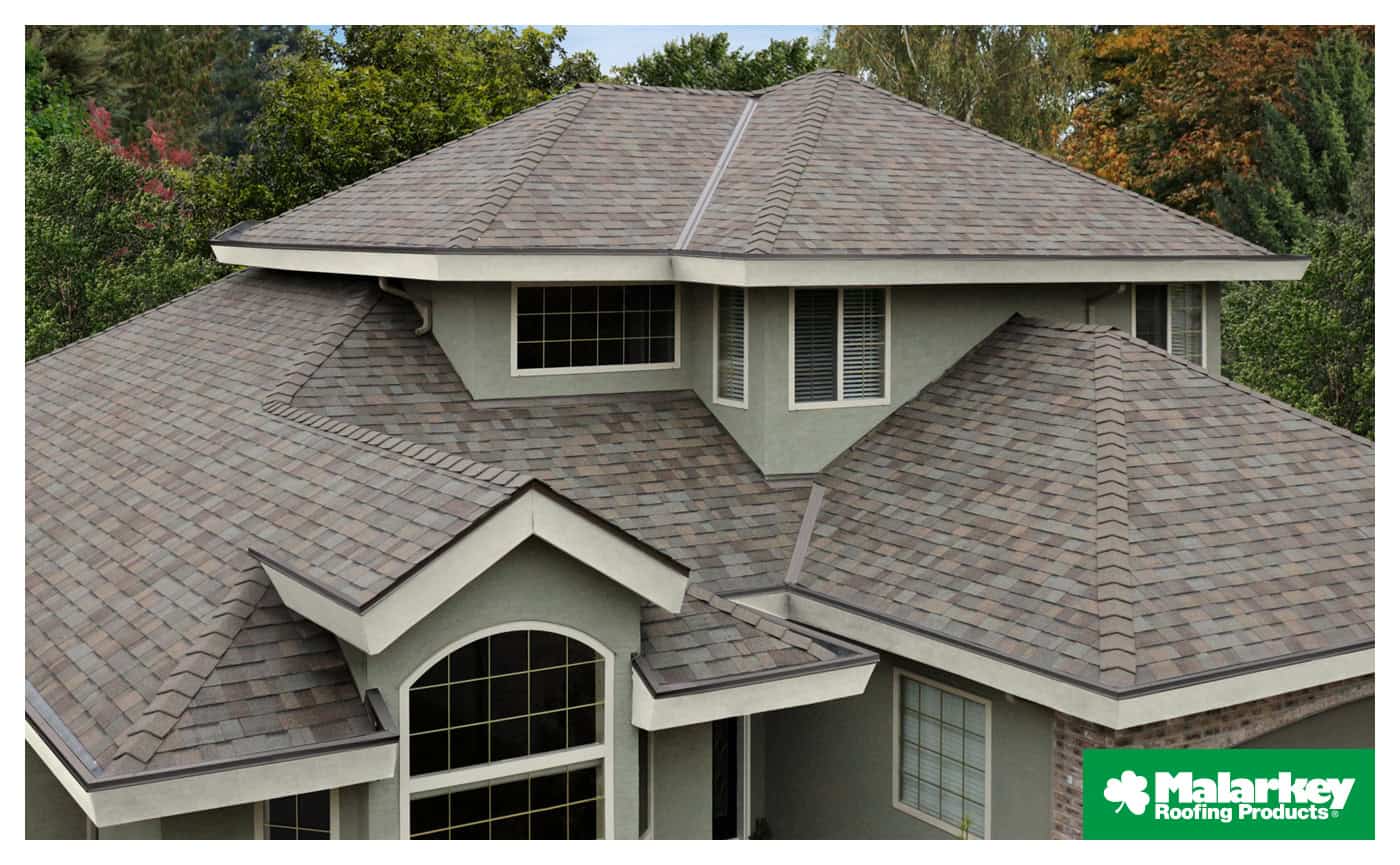 Home with Malarkey Roofing Products Natural Wood Highlander NEX Shingles Best Omaha Roofing Company - ReThink Construction and Claims